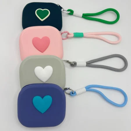 Dog treat purse silicone with heart detail in blue, green, prink, grey