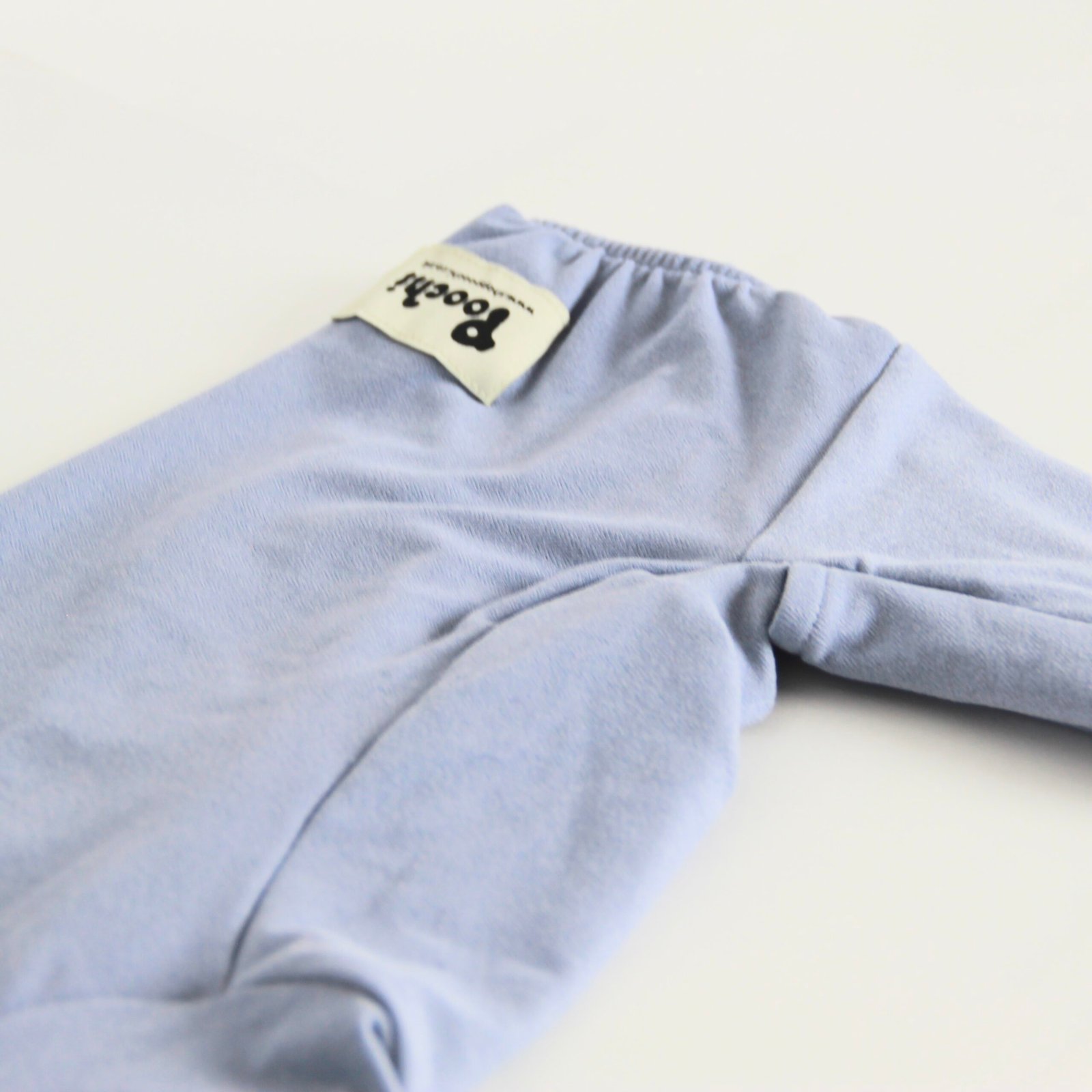 Poochi Classic Soft Grey Dog Coat in lightweight fleece, fabric and Poochi label detail